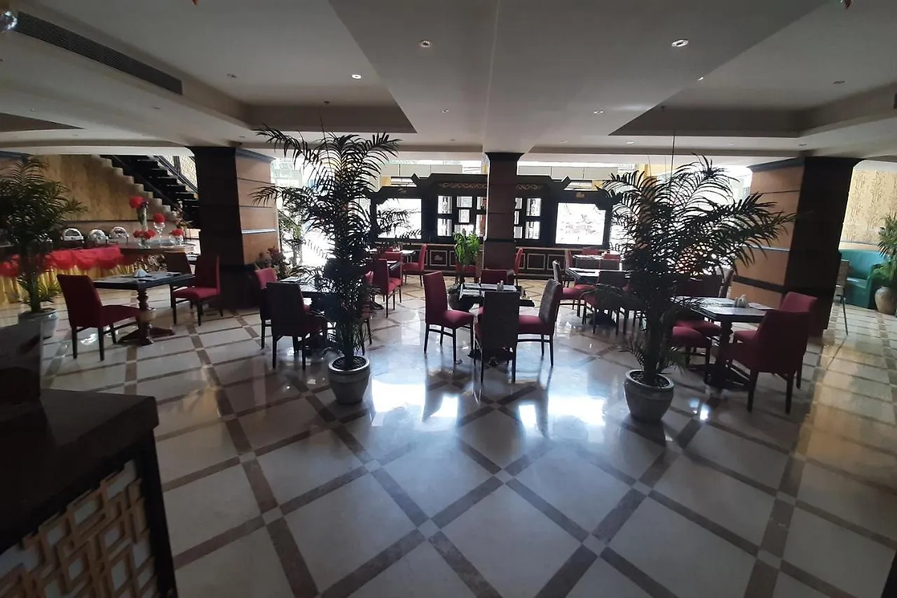 Capital O 549 The Blue Rose Hotel Cidde